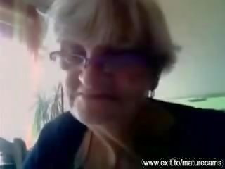 55 years old granny shows her big tits on cam film