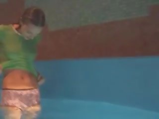 Thin girl mastrubating in pool